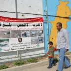 Sign warning about cluster sub-munitions and unexploded ordnance in South Lebanon.